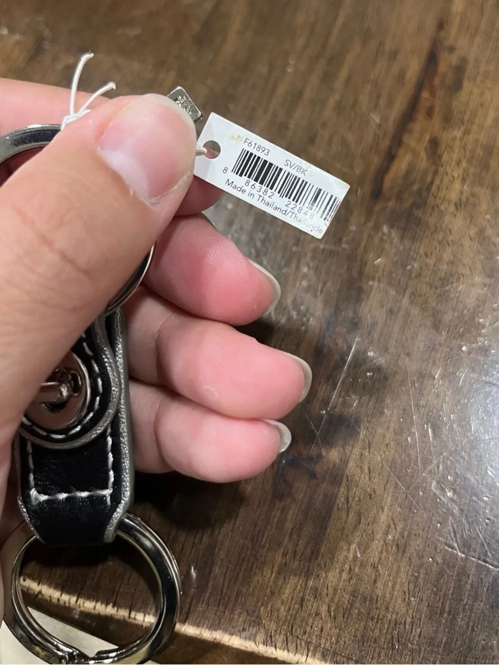 Coach Men’s Black Leather Keychain with Silver Hardware